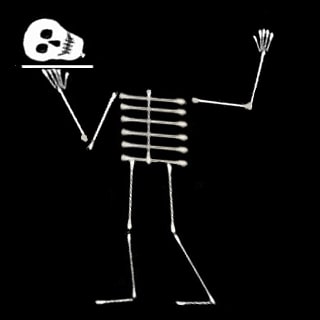 cotton swab skeleton on construction paper