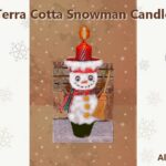 snowman in a clay pot candle holder