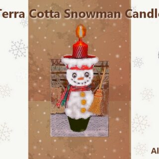 snowman in a clay pot candle holder