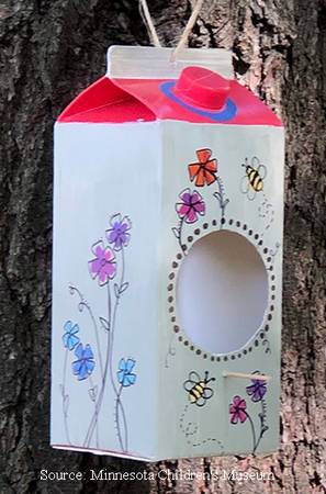 painted and decorated milk carton bird feeder