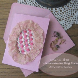 homemade greeting card with oval woven ribbon and lace inset