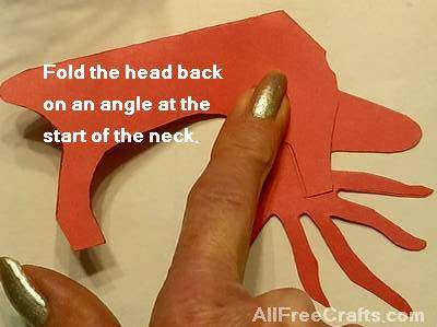 folding the reindeer head back on an angle